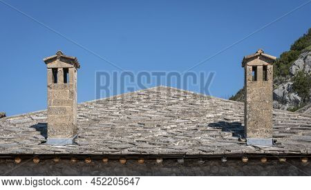 Stone Tiled Roof And Chimneys In Pocitelj Medieval Village In The Capljina Municipality In Bosnia An