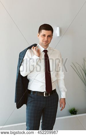 Portrait Of A Male Freelancer. Decentralized Work Of Digital Nomads, Hybrid Work Model.
