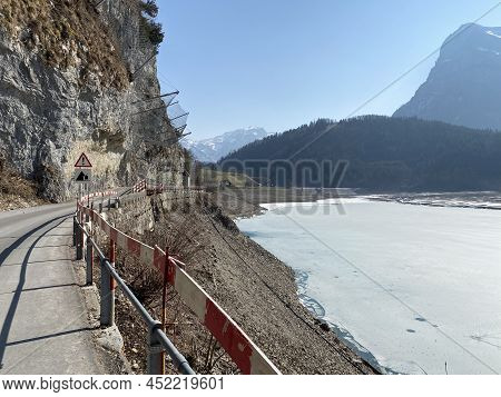 Thawing A Frozen Lake Klöntalersee Or Klontaler Lake During Early Spring In The Alpine Valley Klönta