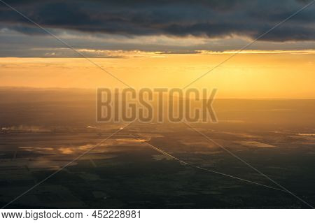 Sunset Of Irrigation Fields With Clouds And Shadow
