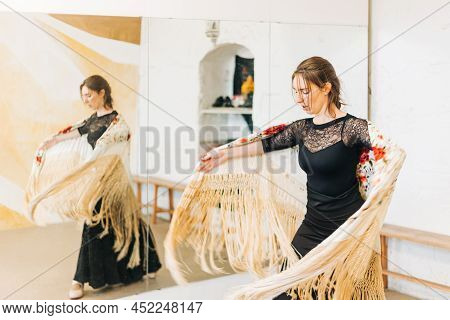 Flamenco Dancer Reflected In The Dance Studio Mirror