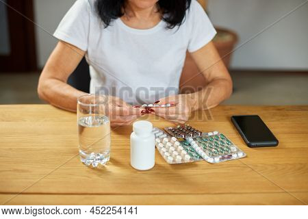 Senior Woman Take Daily Vitamins, Beauty Supplements