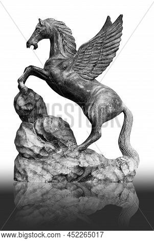 Flying Horse, Wood Carving Art On A White Background, The Floor, Shadow