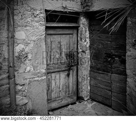 Old Wooden Doors In Poffabro, An Historic Medieval Village In The Val Colvera Valley In Pordenone Pr
