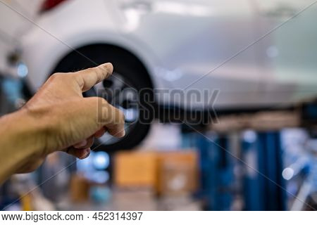 Bangsaen Thailand Mar 2022 This Car Mazda 2 Brand Japan Waiting For Repair On Car Lift In Garage Dea