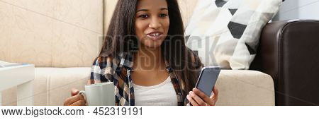 Portrait Of Woman Surprised With End Of Movie, Watching Film Online On Website, Open Laptop On Lap. 