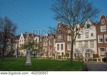 Amsterdam, Netherlands, March 2022. The Beguinage In Amsterdam With Historic Facades.