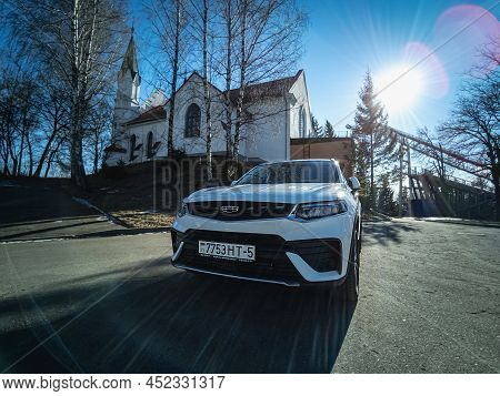 Minsk, Belarus-april 2022: Geely Tugella Car Against The Background Of The Church Of St. Matthew In 