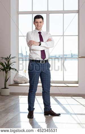 Portrait Of A Male Freelancer. Decentralized Work Of Digital Nomads, Hybrid Work Model.