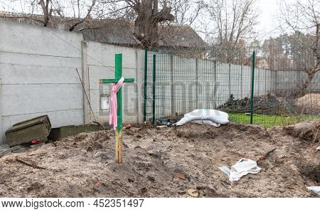 Bucha, Ukraine - Apr. 03, 2022: People Buried Their Dead Relatives And Neighbors In The Yards During