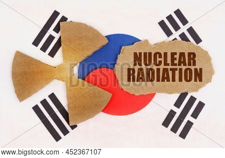 The Concept Of Industry And Radiation. On The Flag Of South Korea, The Symbol Of Radioactivity And T