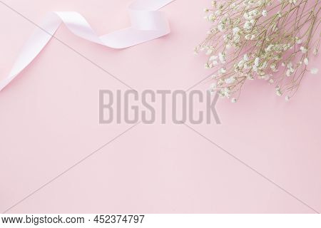 Gypsophila Flowers On Pink Pastel Background, Minimalism, Spring Flower Blosssom Concept, Flat Lay, 