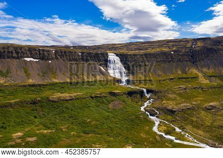 Aerial View Of Dynjandi Waterfall, Also Known As Fjallfoss, Located On The Westfjords Peninsula In N