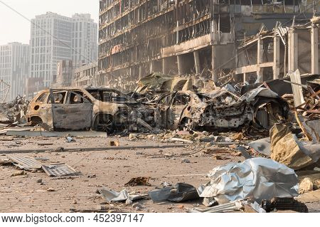2022 Russian Invasion Of Ukraine War Torn City Destroyed Car Burn Out. Russia War Damage Cars Destru
