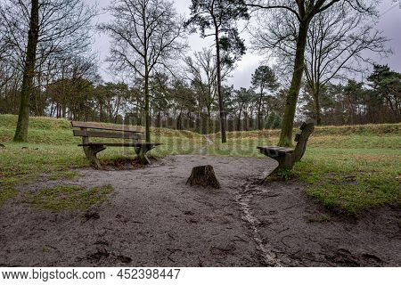 Relaxing Benches On The Muddy Footpath At The Meadow