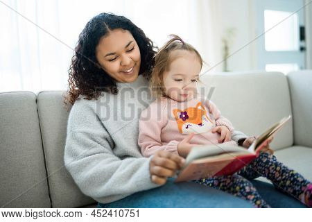 Babysitter Black Woman Read Book With Little Child Girl