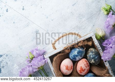 Easter Eggs. Dyed Easter Eggs With Marble Stone Effect Ref And Blue Color In Rustic Style On Light G