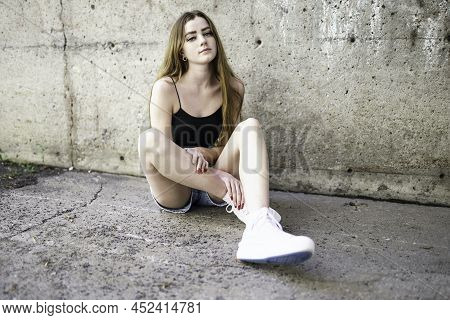 Nice And Cool Teen Girl Standing Portrait On Concreate Place