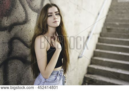 Nice And Cool Teen Girl Standing Portrait On Concreate Place