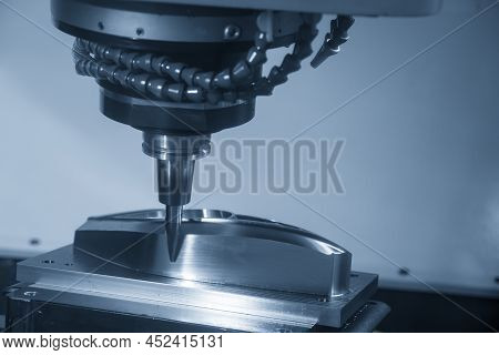 The Cnc Milling Machine Cutting The Mold Parts By Barrel Tool. The Mold And Die Manufacturing Proces
