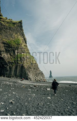 The Black Sand Beach Of Reynisfjara And The Mount Reynisfjall From The Dyrholaey Promontory In The S