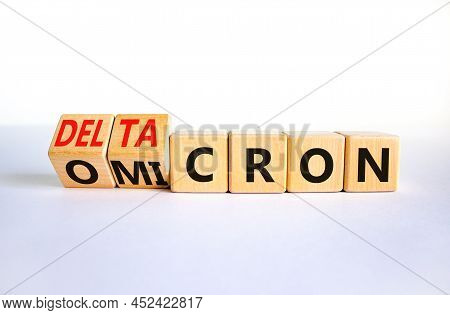 Covid-19 Omicron Or Deltacron Symbol. Turned Cubes And Changed The Concept Word Omicron To Deltacron