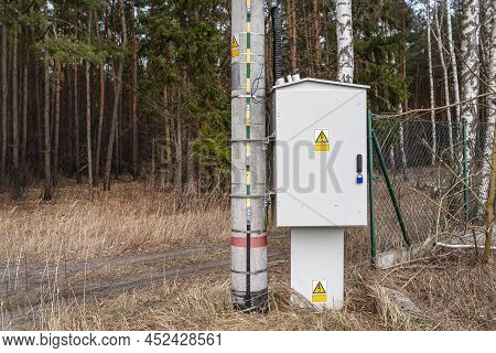 The Ground Plate Is Attached To The Concrete Pole From The Low Voltage Transformer Station, The Elec