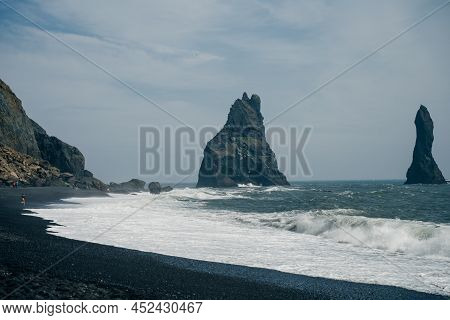 The Black Sand Beach Of Reynisfjara And The Mount Reynisfjall From The Dyrholaey Promontory In The S