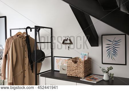 Modern Hallway Interior With Stylish Furniture And Key Holder