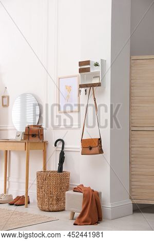 Modern Hallway Interior With Stylish Dressing Table And Key Holder
