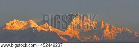 Golden Color Snowcapped Himalaya And Mount Kangchenjunga During Sunrise, The Majestic Kangchenjunga,