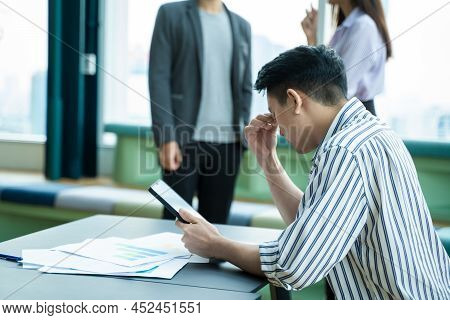 Stressed Businessman,asian Young Man Are Tired And Stressed About Working At The Office.