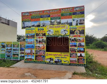 In Front Of Sri Kamadhenu Kshetra Located Tourist Office Arrange Tour To Place And Timing Board With