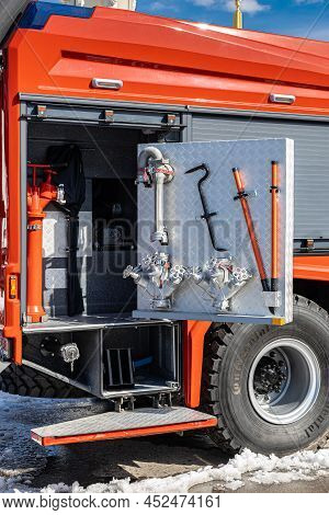 Moscow, Russia - April 04, 2022: Fire Truck With An Open Hatch In Which The Tool. High Quality Photo