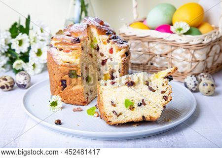 Craffin (cruffin) With Raisins And Candied Fruits. Easter Bread Kulich And Painted Eggs. Easter Holi