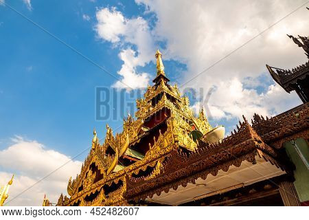 The Castle Mondop Square Hall With A Pyramidal Roof And The Golden Pagoda In The Burmese Temple