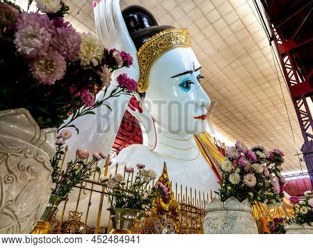 Big White Buddha Image In Reclining Posture