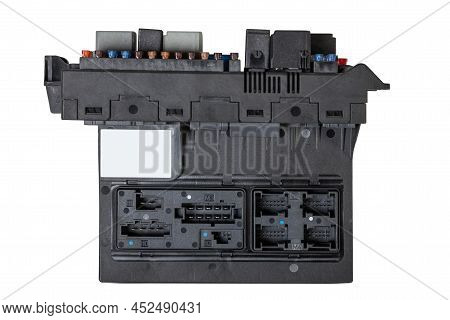 A Plastic Car Engine Control Unit With Metal Elements On A White Isolated Background Is The Connecti