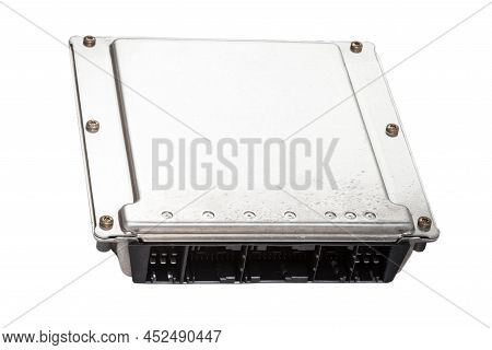 A Metall Car Engine Control Unit With Metal Elements On A White Isolated Background Is The Connectin