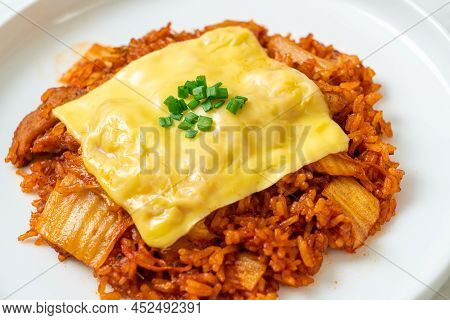 Kimchi Fried Rice With Pork And Topped Cheese