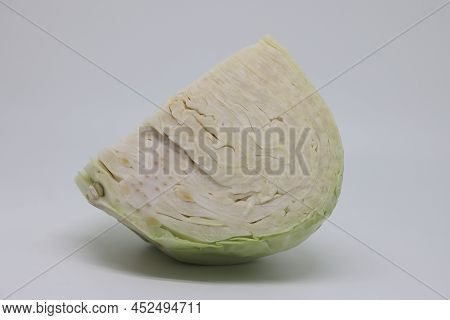 Sliced White Cabbage Quarter And Chopped Stack Isolated On White Background