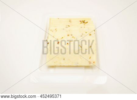 Pepper Jack Cheese Slices Isolated Over A White Background