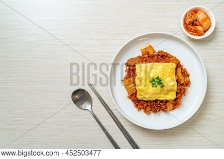 Kimchi Fried Rice With Pork And Topped Cheese