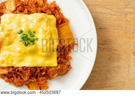 Kimchi Fried Rice With Pork And Topped Cheese