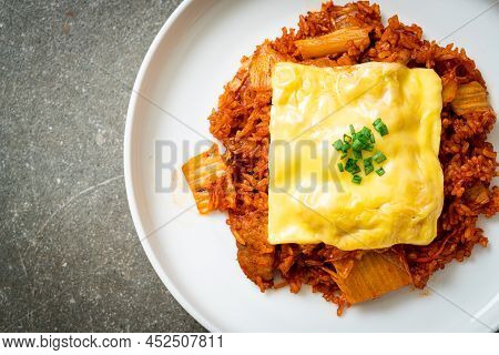 Kimchi Fried Rice With Pork And Topped Cheese