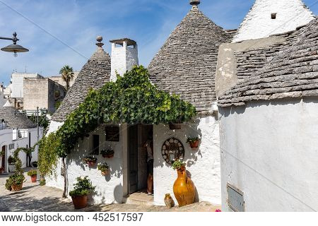 Alberobello, Italy - September 16, 2019: Tradtional White Houses In Trulli Village. Alberobello, Ita