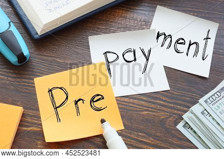 Prepayment Is Shown On A Business Photo Using The Text