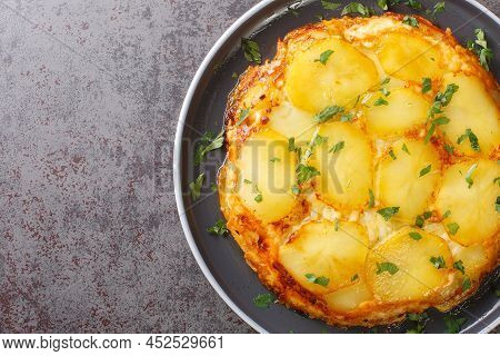 Pan Haggerty Potatoes Feature Sliced Potatoes, Sauteed Onions, Topped With Dubliner Cheese Closeup I