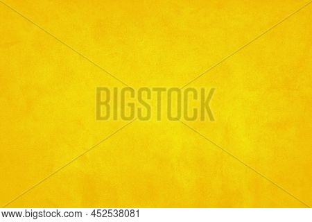 Abstract Rustic Yellow And Orange Wall Background Texture Design.