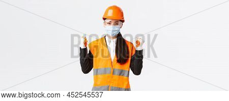 Covid-19 Safety Protocol At Enterpise, Construction And Preventing Virus Concept. Successful Winning